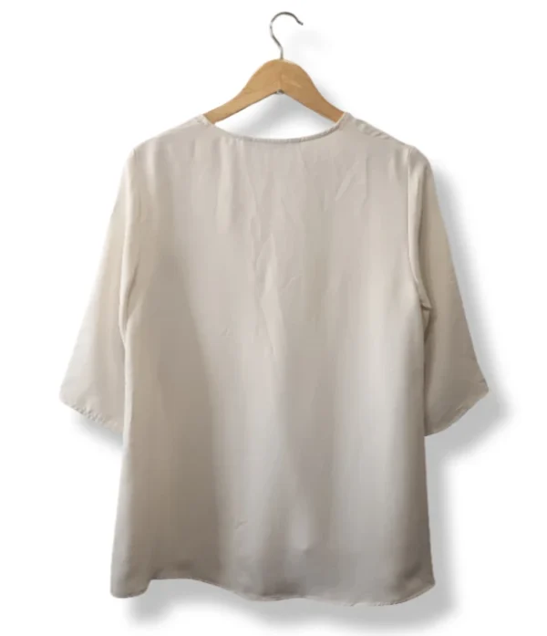 Blusa blanca con cierre frontal Zara – Talla M