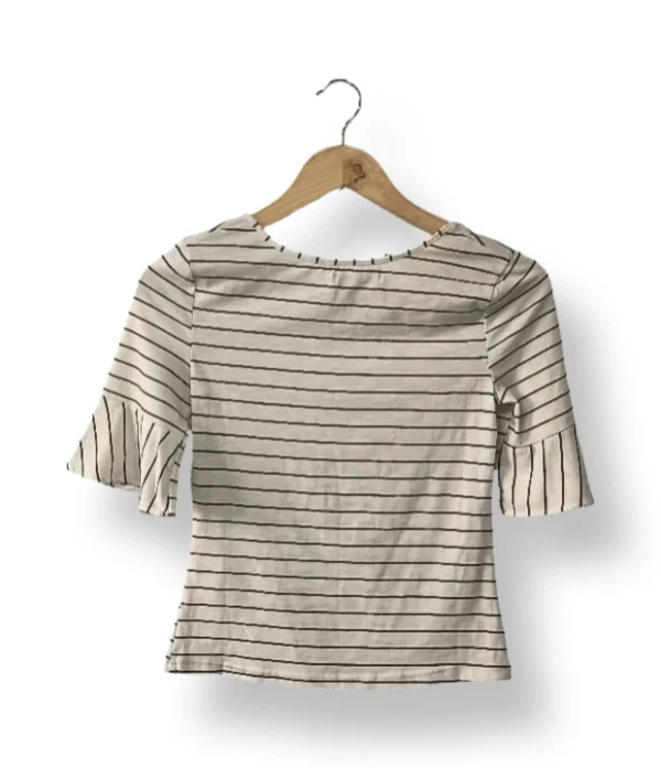 IMG_20251021_161408 Polera rayada blanca Cache Cache talla S