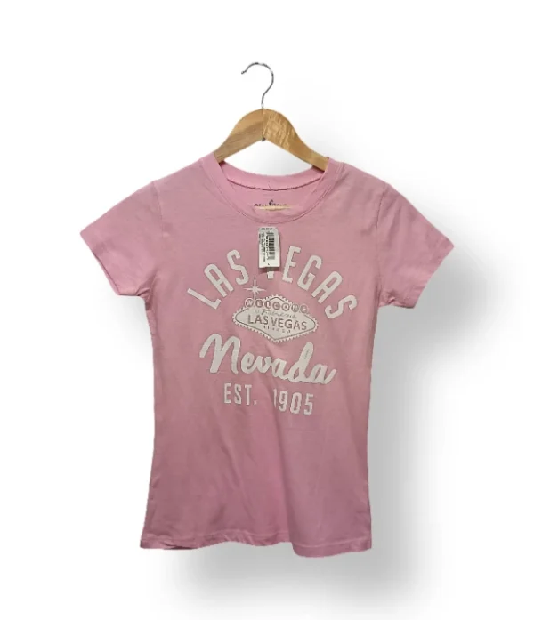 Polera rosa “Las Vegas Nevada” Curfew Girl talla L niño (nueva con etiqueta)