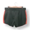 IMG_20251106_191844 Short deportivo negro con franjas rojas Reebok – Talla M