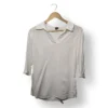 IMG_20251116_215705 Blusa blanca IO con cuello abierto y mangas 3/4 – Talla M