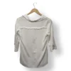 IMG_20251116_215711 Blusa blanca IO con cuello abierto y mangas 3/4 – Talla M