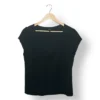 IMG_20251116_223913 Polera negra IO con aplicaciones brillantes, talla M