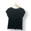 IMG_20251116_223921 Polera negra IO con aplicaciones brillantes, talla M